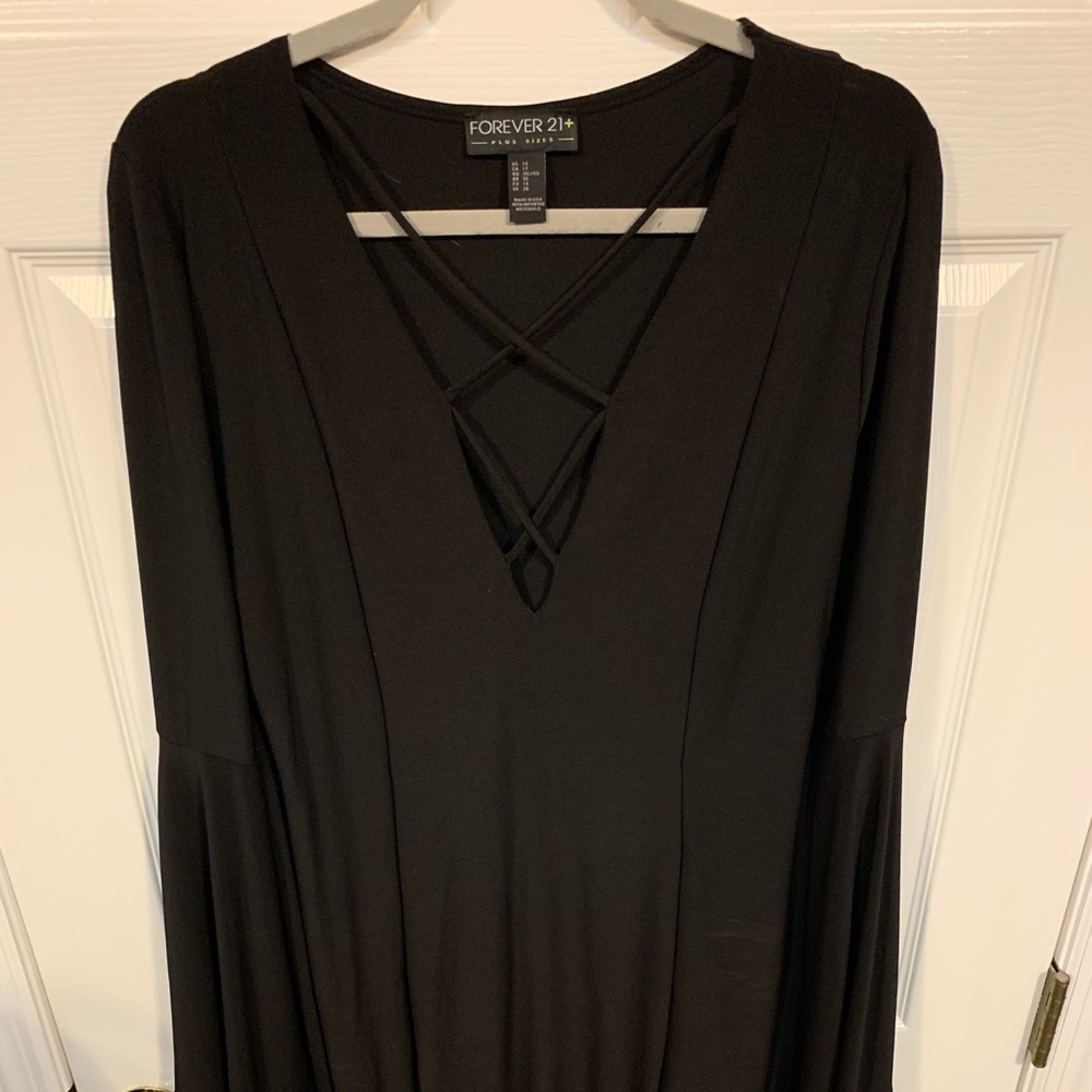 Black cocktail dress with flared sleeves